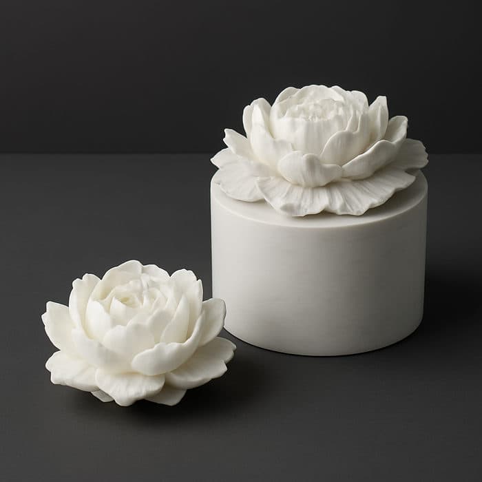 Set: vaso de resina con vela floral y tapa de flor que también es vela.