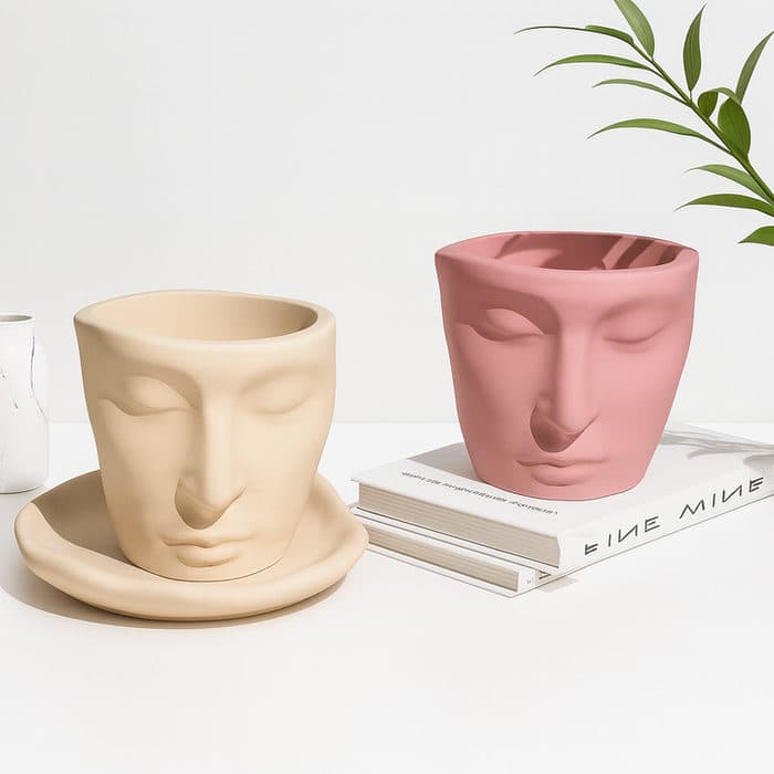 Maceta-rostro minimalista de resina. Multiusos: vela, plantas, lápices.
